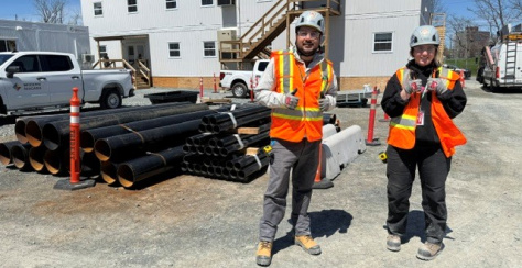 Participants in the pipe trades program standing at the Halifax Infirmary construction site 
